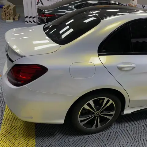 White-to-gold chameleon: a pearl white that shifts as you walk around it — view 2